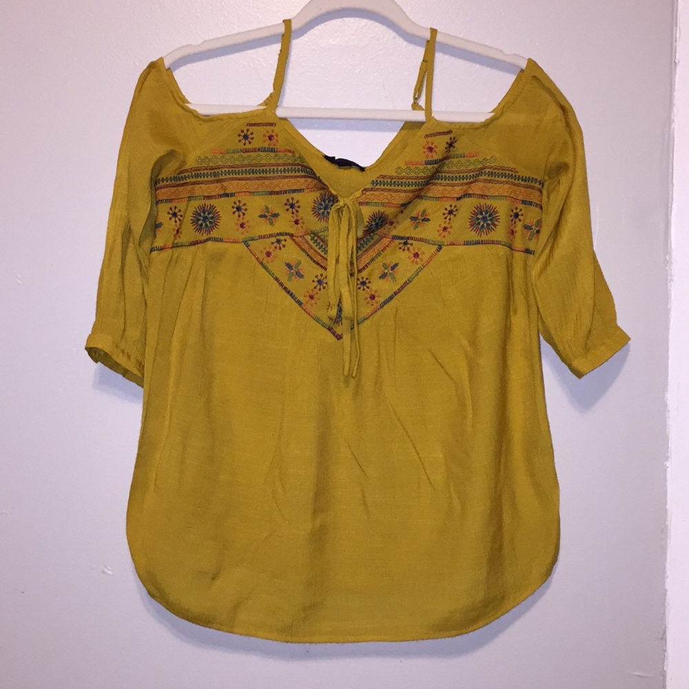 Shoulder cut out embroidered blouse